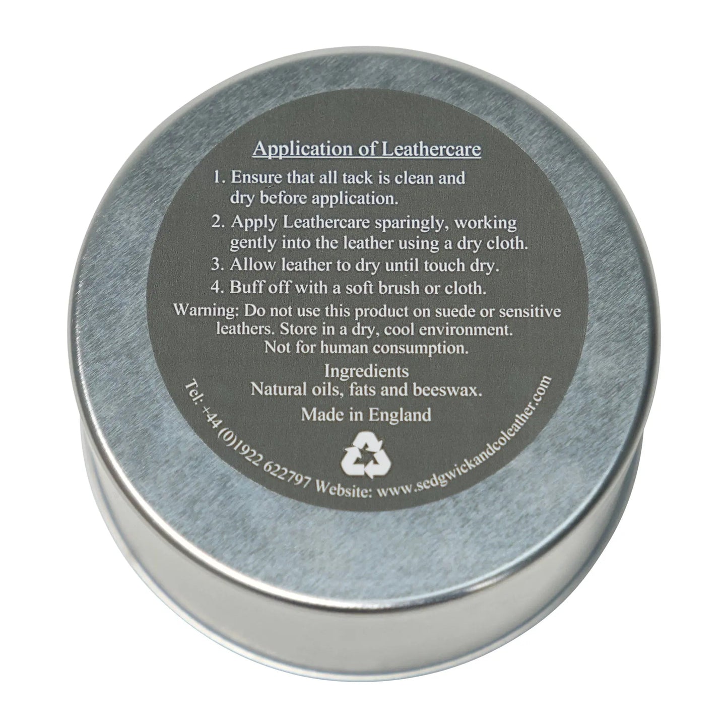Metal tin lid with application instructions and product details on a white background