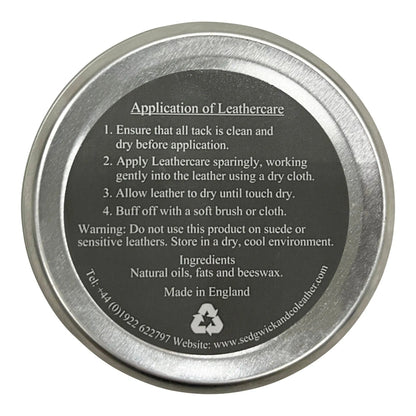 Metallic tin lid with application instructions and branding on a white background