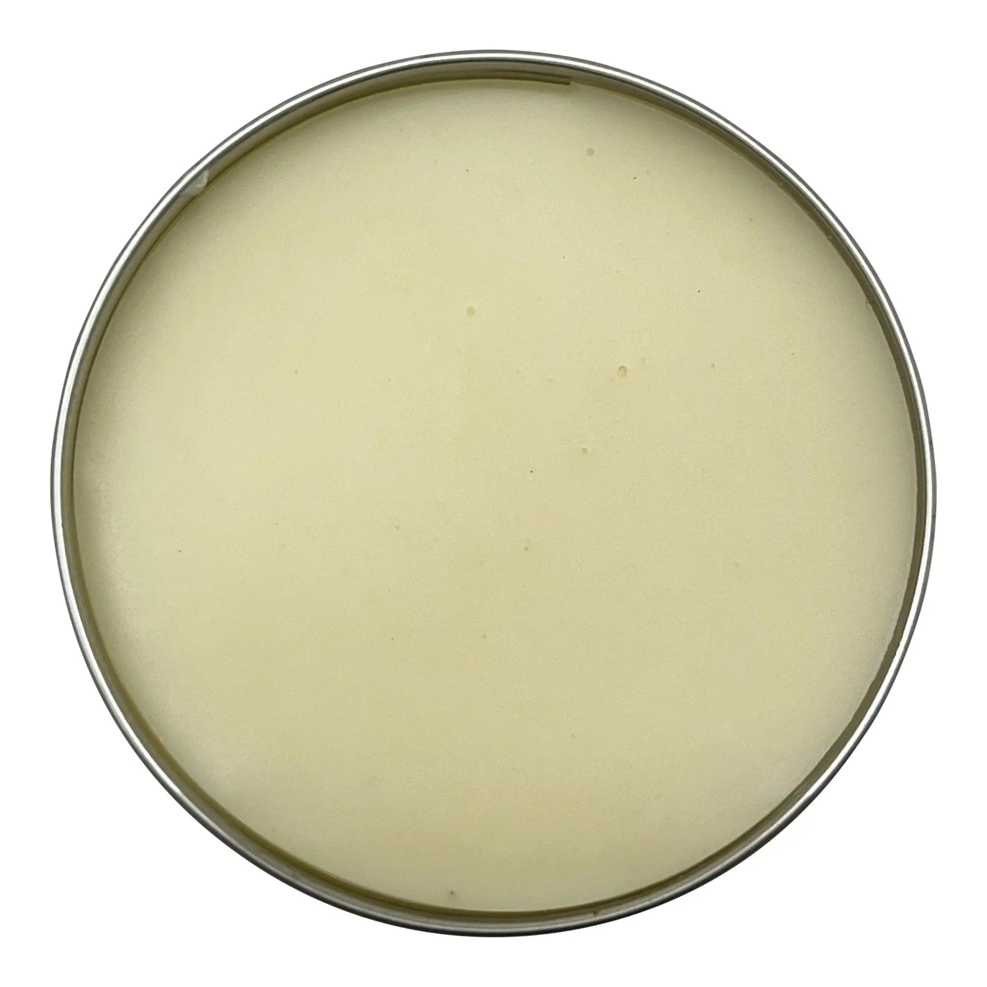 Round container of cream on a white background