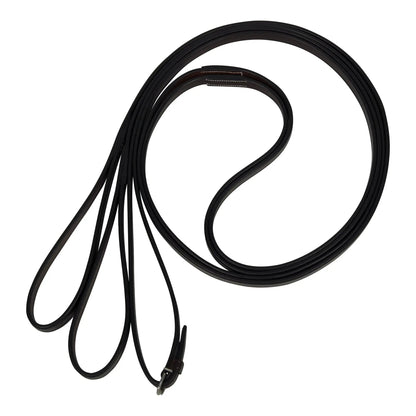 Black leather dog leash coiled on a white background
