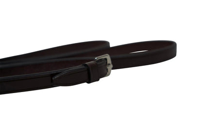 Black leather belt with a silver buckle on a white background