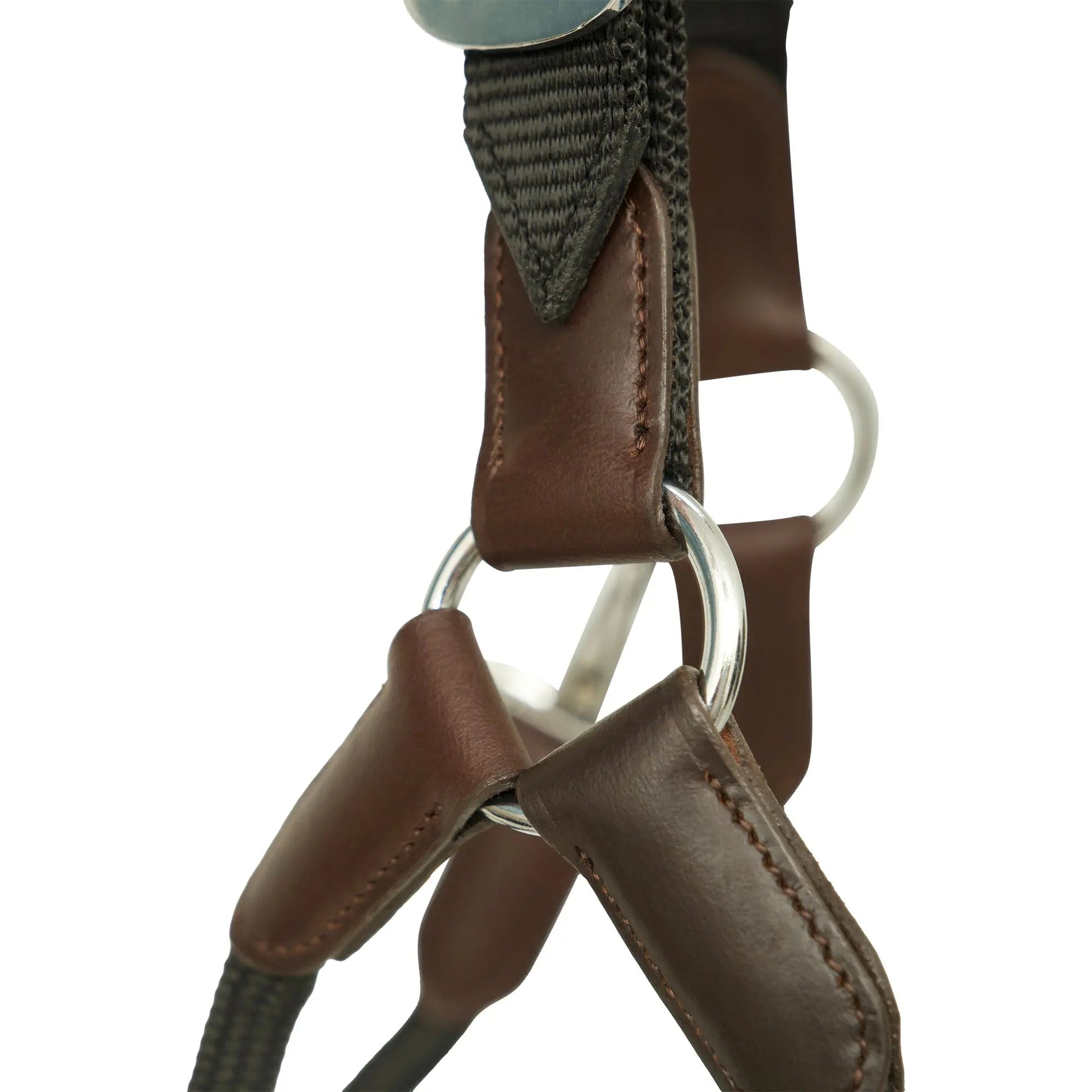 Close-up of a brown leather strap with metal hardware on a white background