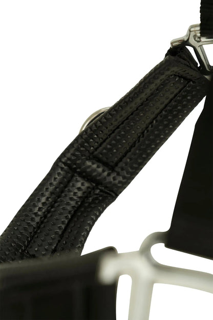 Close-up of a black bowstring with a white background