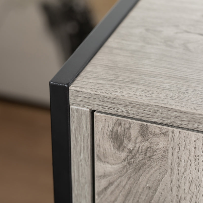 Close-up of a wooden side table with a black metal leg.