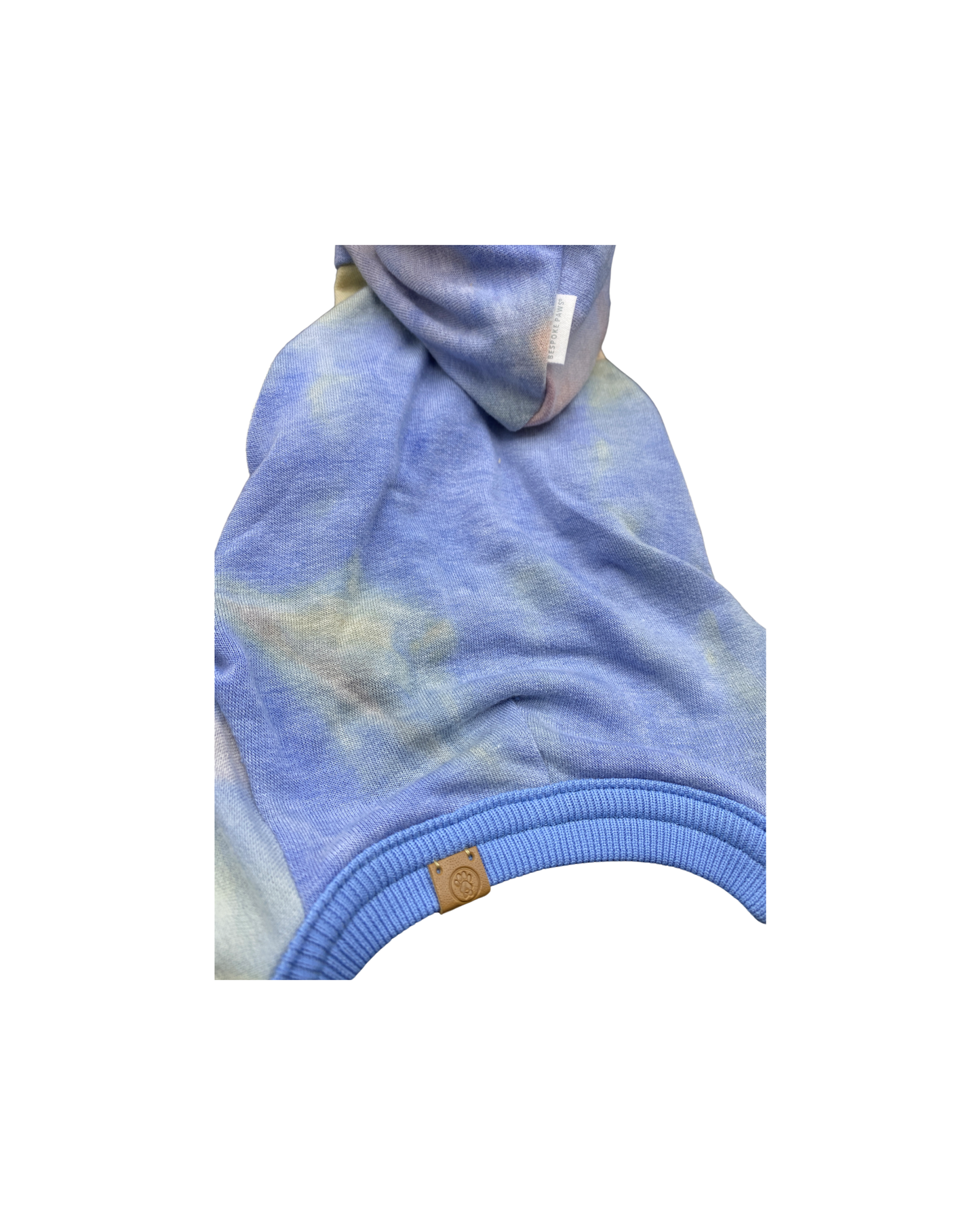 Blue tie-dye hoodie with a brand tag on a white background