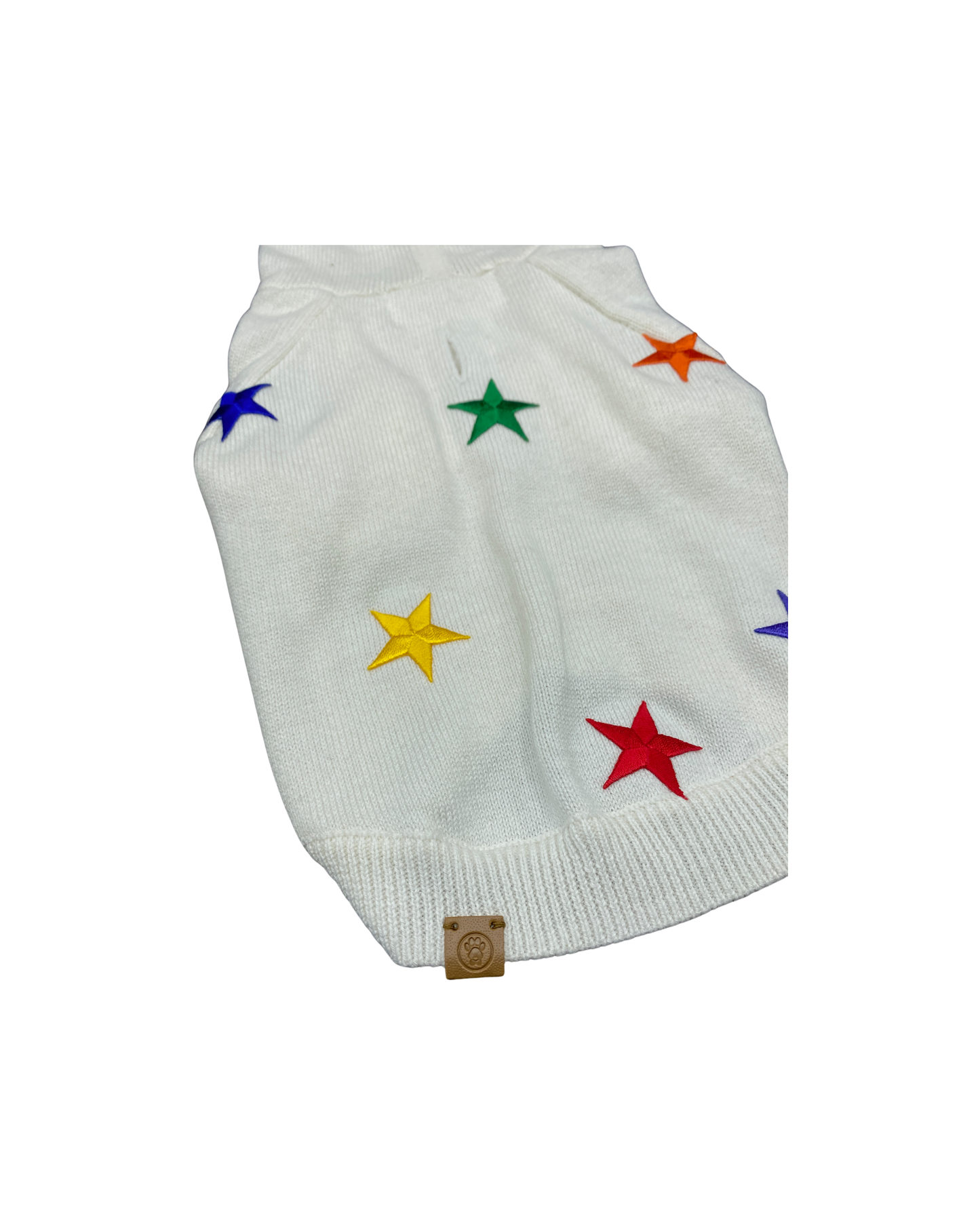 White dog sweater with colorful stars on a white background