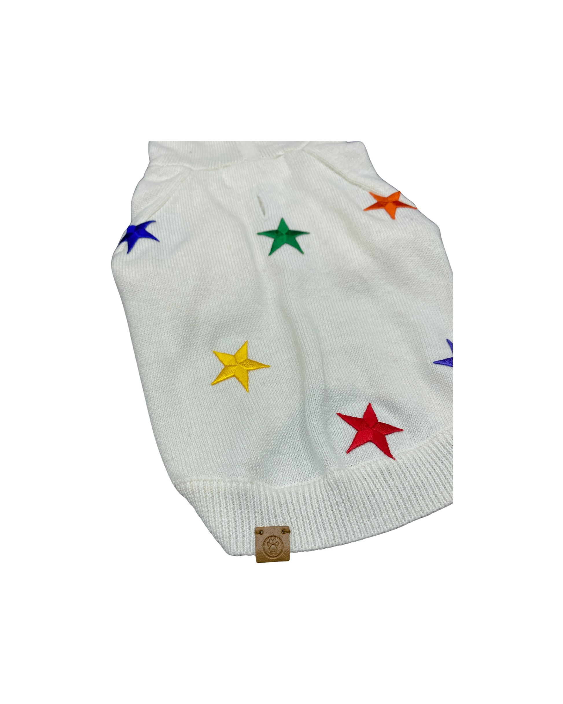 White dog sweater with colorful stars on a white background