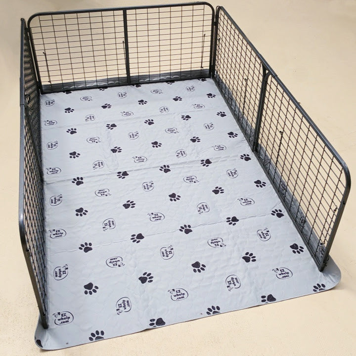 Pet playpen with a paw print mat on a beige background