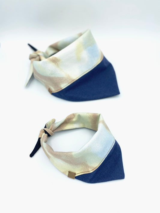 Two bandanas with a beige and blue pattern on a white background