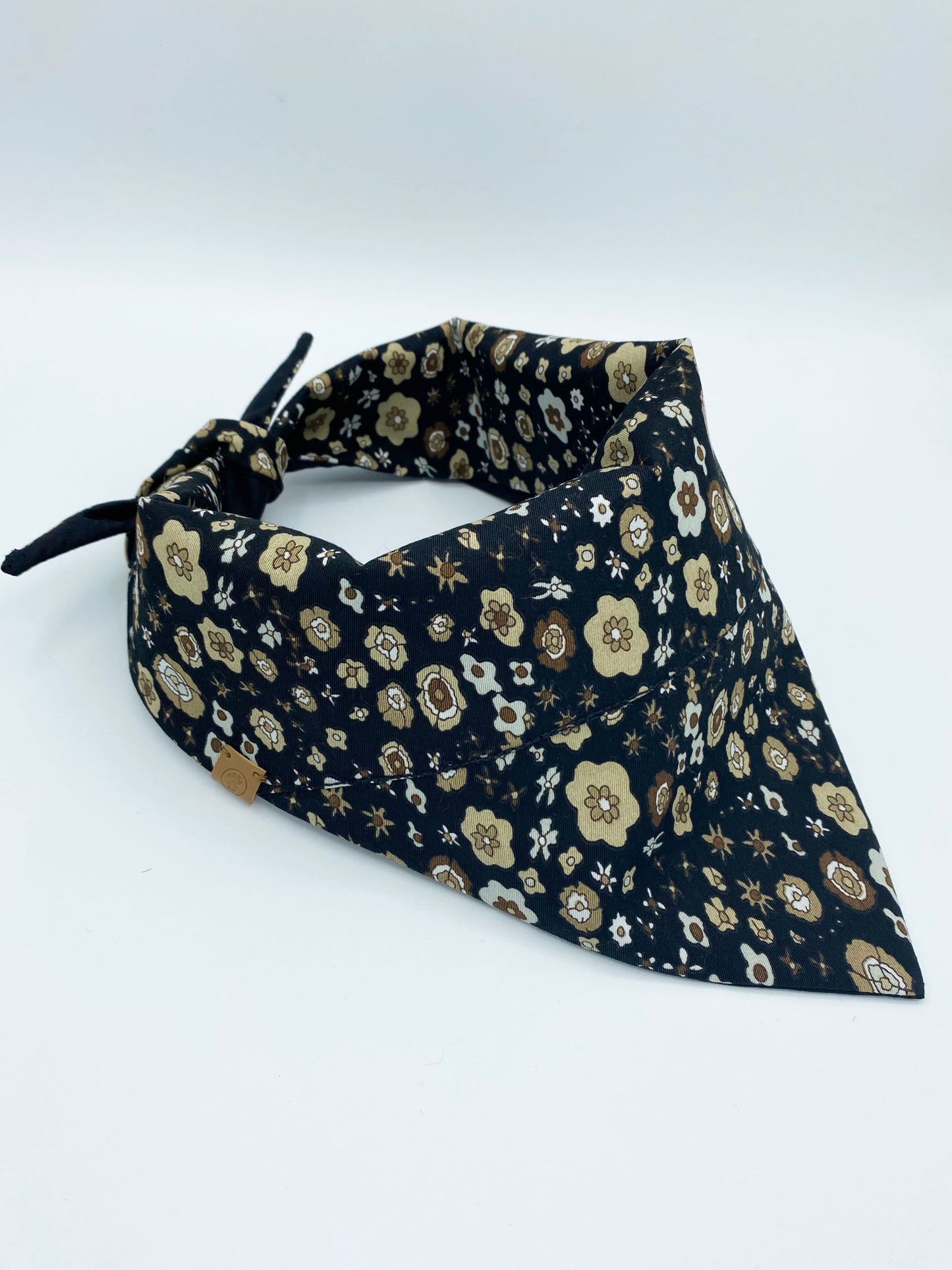 Floral patterned bandana on a white background