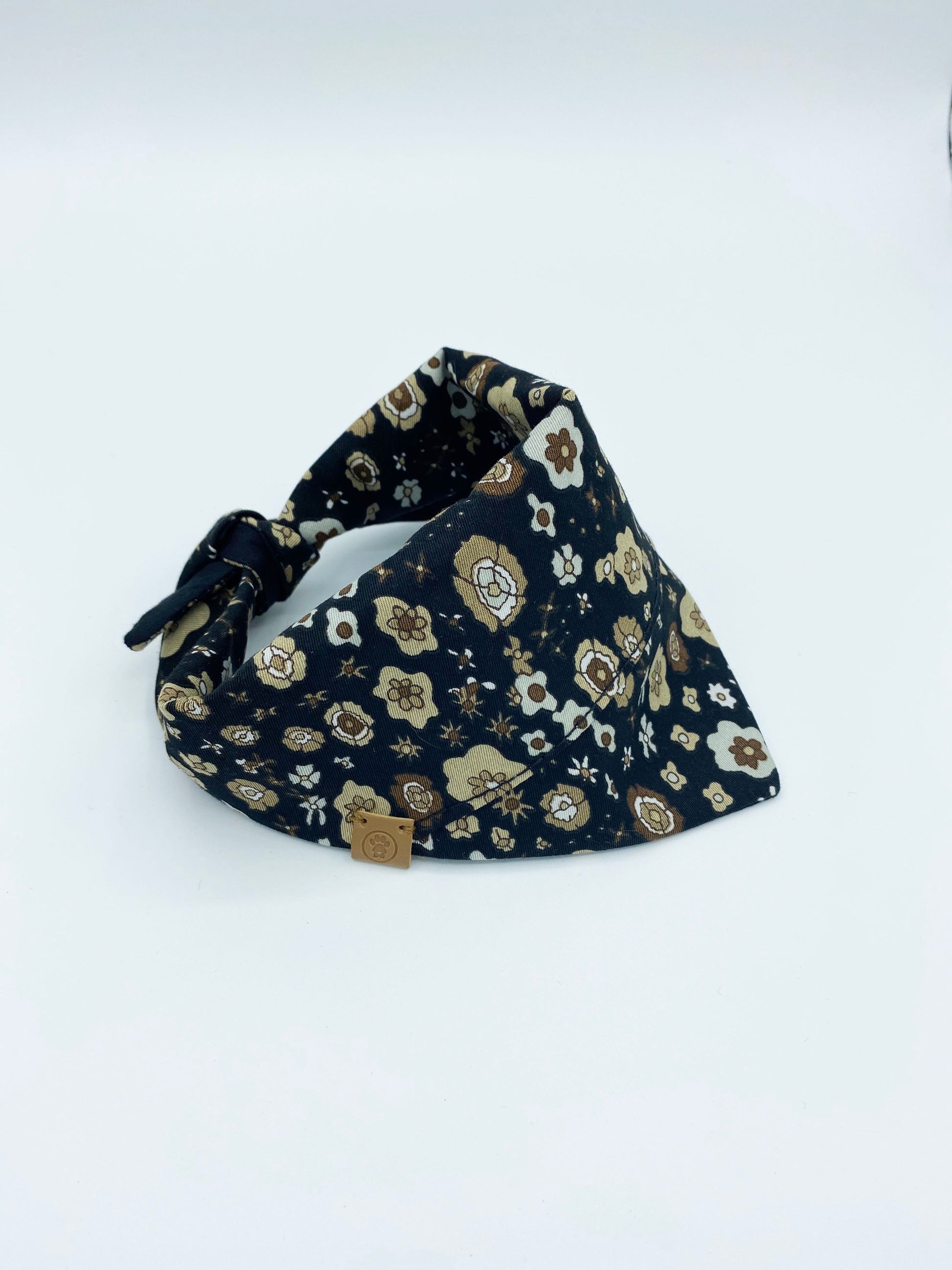 Floral patterned bandana on a white background