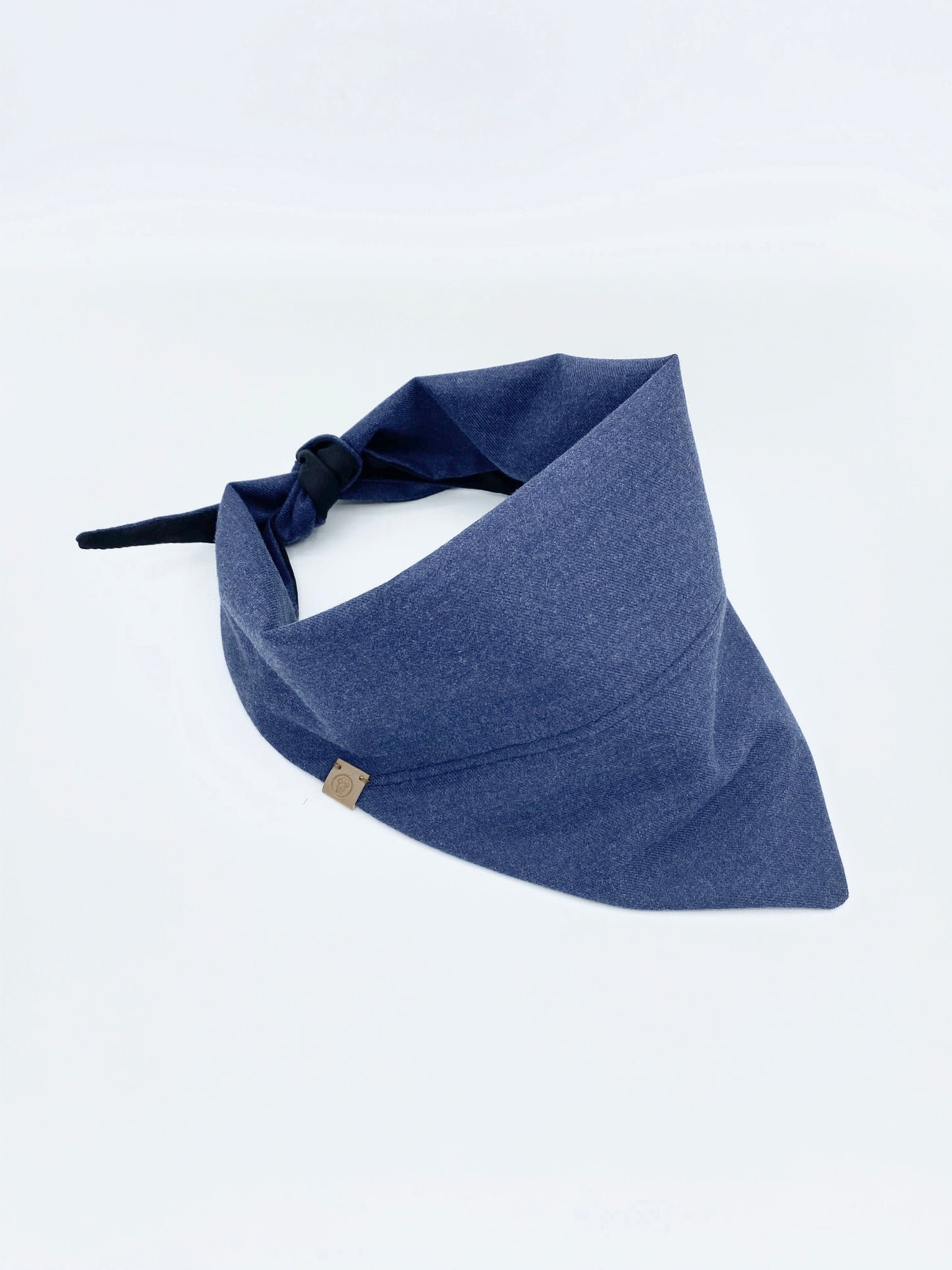 Blue bandana with a knot on a white background