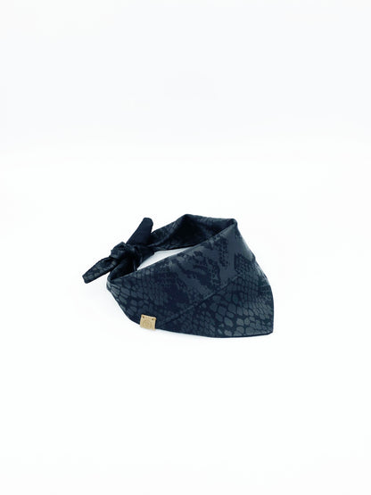 Navy blue patterned headband on a white background
