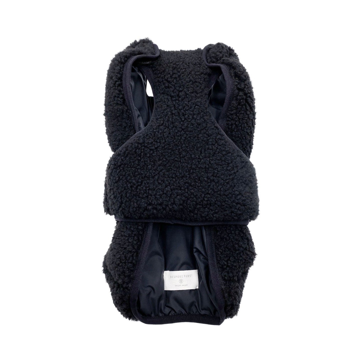 Black fleece baby carrier on a white background