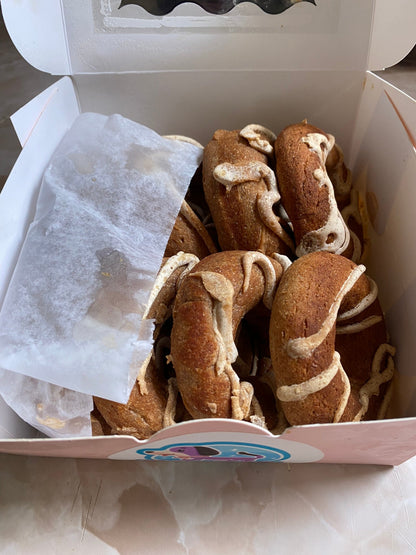 Box of cookies with cream filling on a white background