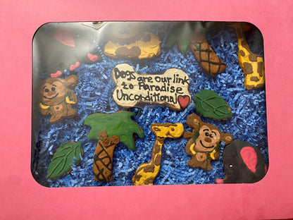 Decorative tray with animal figurines and a quote on a pink background