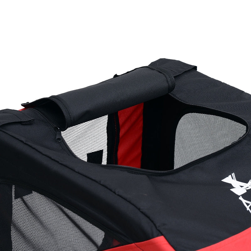 Close-up of a black and red pet carrier with mesh side panels on a white background