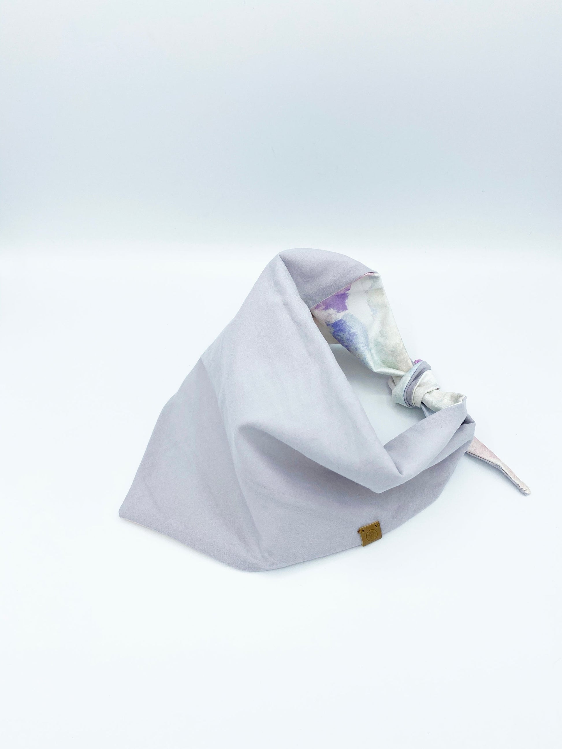 Light gray hood with drawstring on a light gray background
