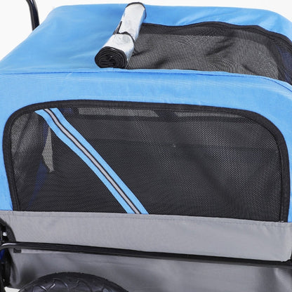 Blue and black pet stroller with a rolled-up mat on top