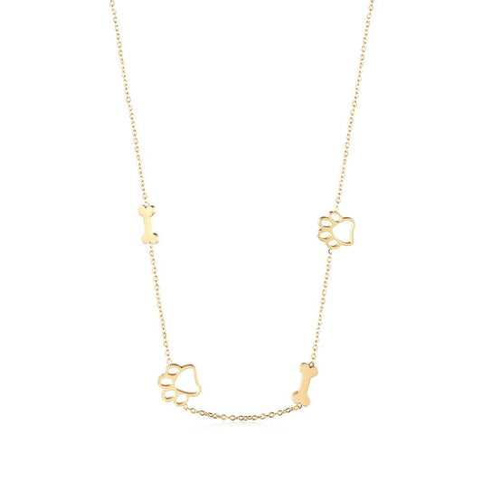 Gold necklace with paw and bone-shaped pendants on a white background