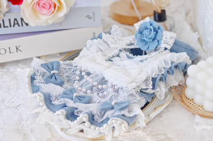 Blue and white lace headband with flowers on a decorative background