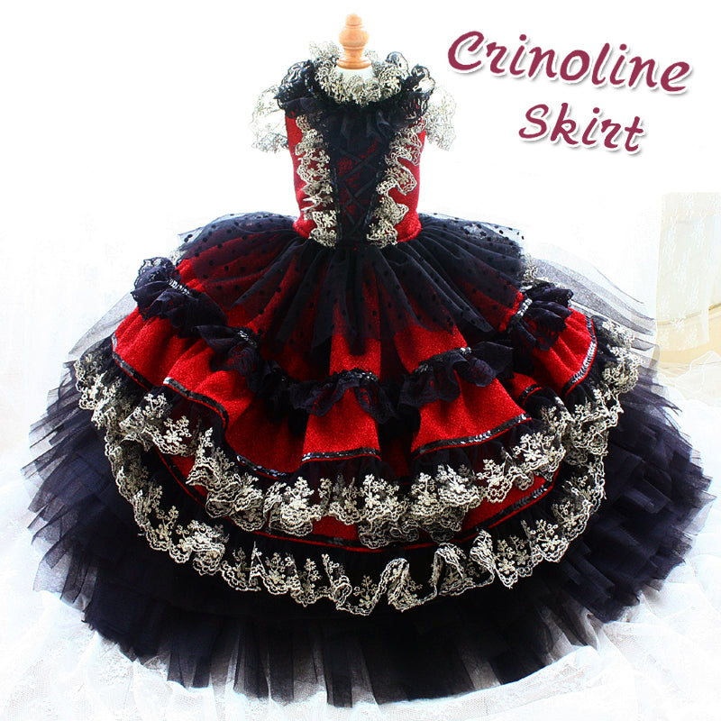 Red and black crinoline skirt with decorative trim on a white background