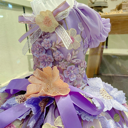 Decorative item with floral patterns and ribbons on a blurred background