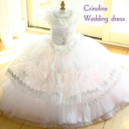 White crinoline wedding dress on a mannequin with a blurred background