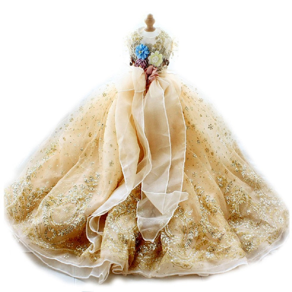 Beige tulle skirt with floral top on a white background