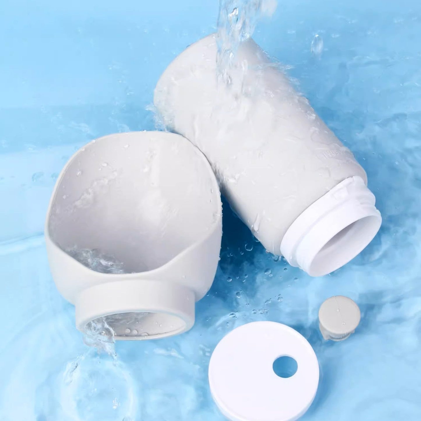 White water filter cartridges with water flowing on a blue background