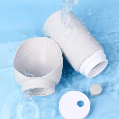 White water filter cartridges with water flowing on a blue background
