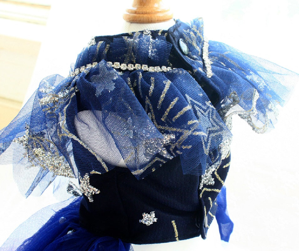 Blue lace scarf with decorative elements on a mannequin