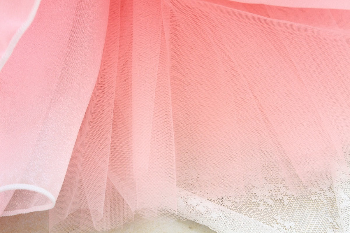 Close-up of pink fabric with a soft focus
