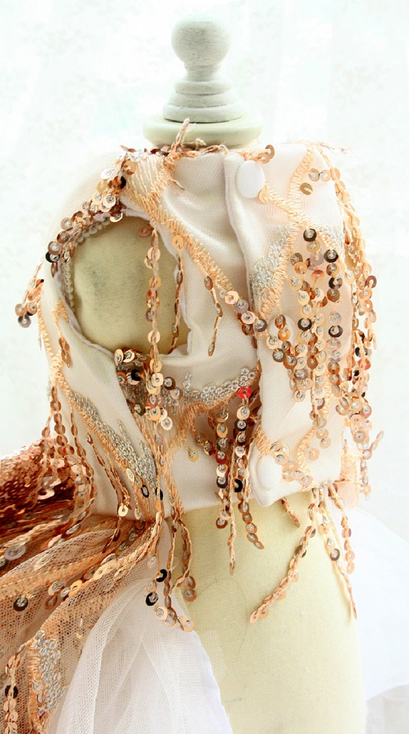 Decorative scarf with beads and sequins on a mannequin against a white background