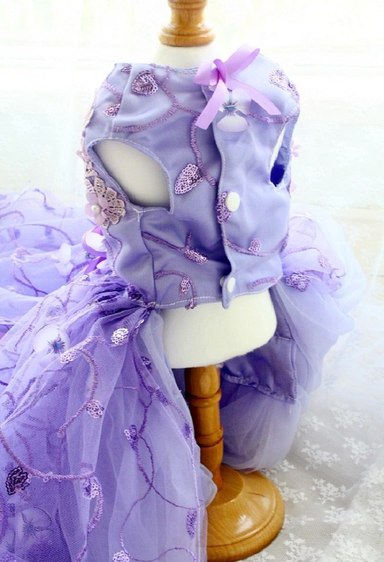 Purple children's outfit on a mannequin with a soft white background
