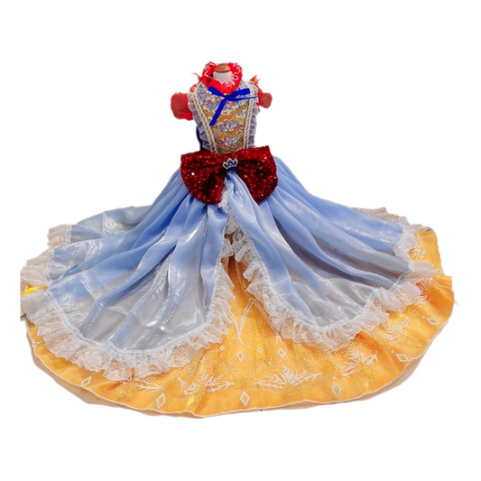 Doll in a blue and red dress with a yellow base on a white background