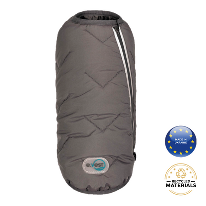 Gray insulated sleeping bag with a brand logo and recycled materials label on a white background