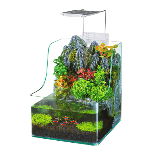 Small aquarium with plants and rocks on a white background