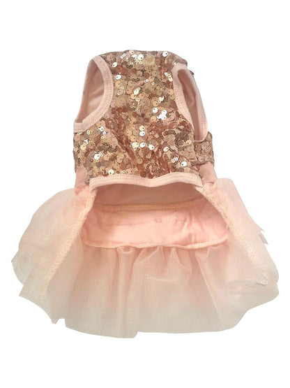 Dog dress with sequined top and tulle skirt on a white background