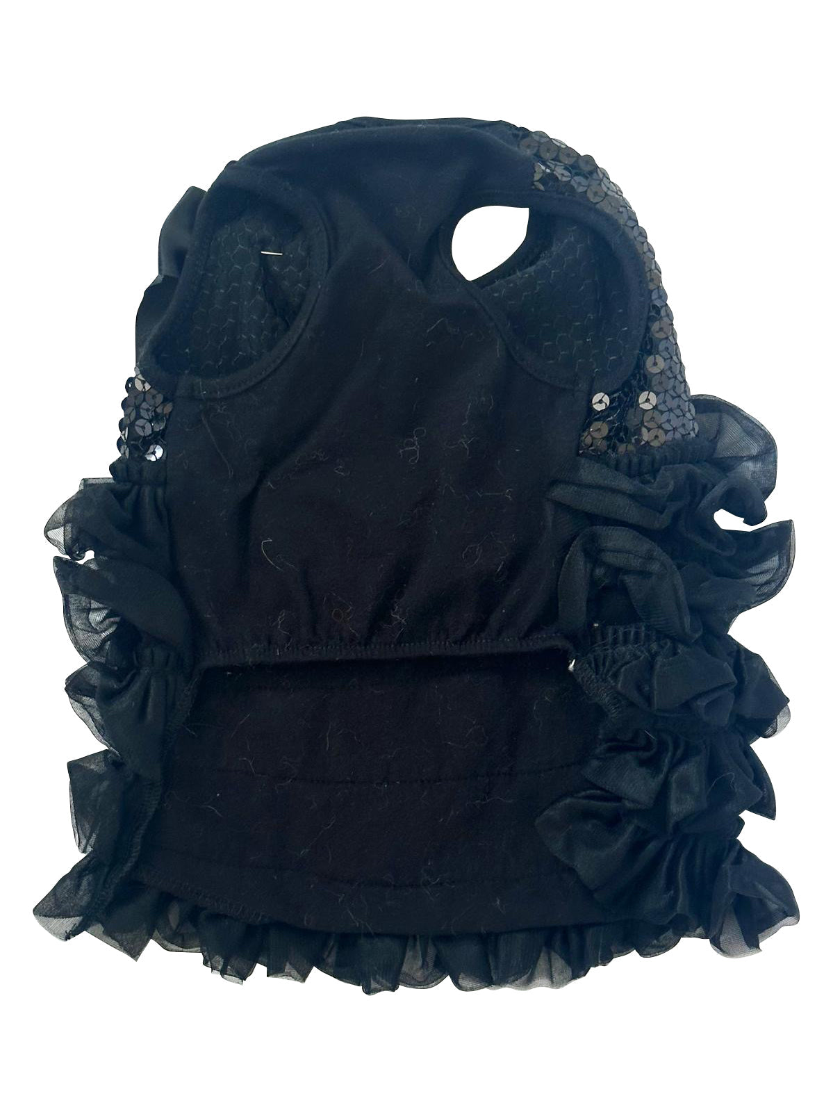 Black pet carrier with ruffles and embellishments on a white background