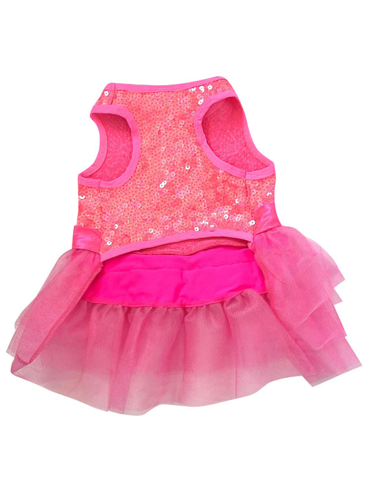 Pink sequined dress with a tutu skirt on a white background