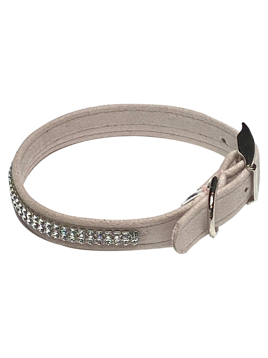 Beige dog collar with rhinestone embellishments on a white background