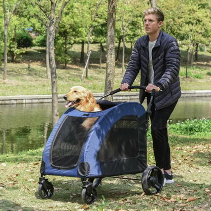 Man pushing a blue pet stroller with a dog in it through a park.
