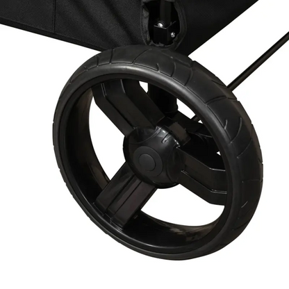 Close-up of a black stroller wheel on a white background