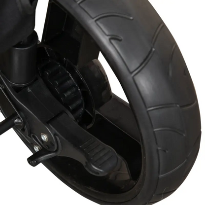 Close-up of a black scooter wheel and suspension on a white background