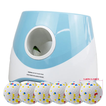 Blue and white device with golf balls featuring colorful dots on a white background