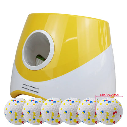 Yellow and white golf ball launcher with golf balls on a white background