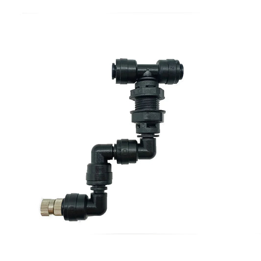 Black plastic plumbing fitting on a white background