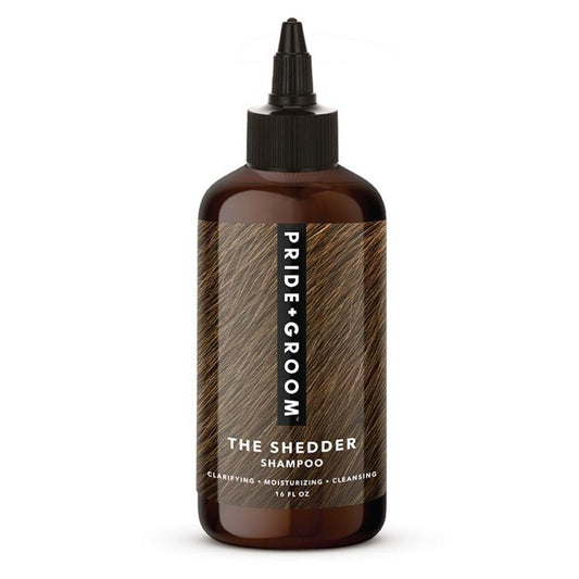 Brown bottle of 'The Shedder Shampoo' by Pride Groom on a white background