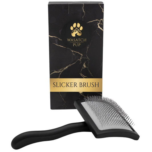 Black slicker brush with marble-patterned packaging featuring 'Wasatch Pup' branding.
